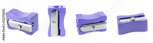 Set with violet pencil sharpeners on white background. Banner design photo
