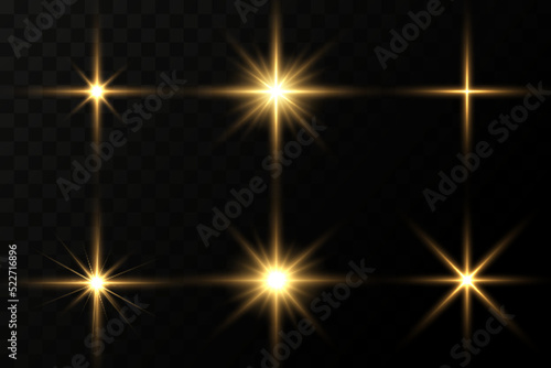 Shining golden stars . Effects, glare, lines, glitter, explosion, golden light. Vector illustration