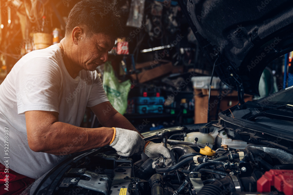 Auto mechanic are repair and maintenance auto engine is problems at car repair shop. Auto mechanic are repair and maintenance auto engine is problems at car repair shop.