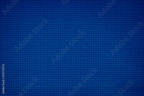 Closeup of blue fabric texture for background used. Pattern blue dark denim, linen, natural cotton satin textile textured.