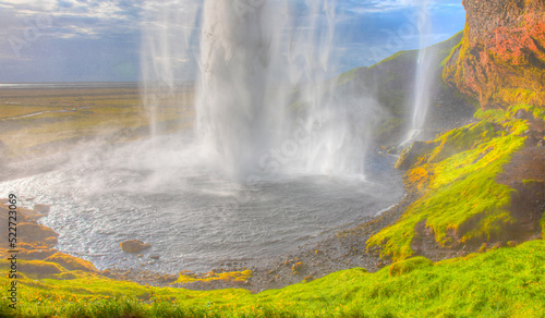 Amazing Seljalandsfoss waterfall with rainbow - Iceland