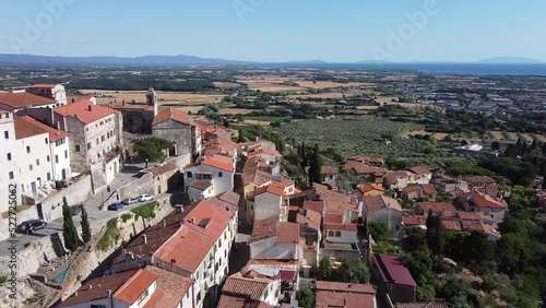 Wallpaper Mural Rosignano Marittimo Maritime clock tower castle aerial panning left view. Summer season Torontodigital.ca