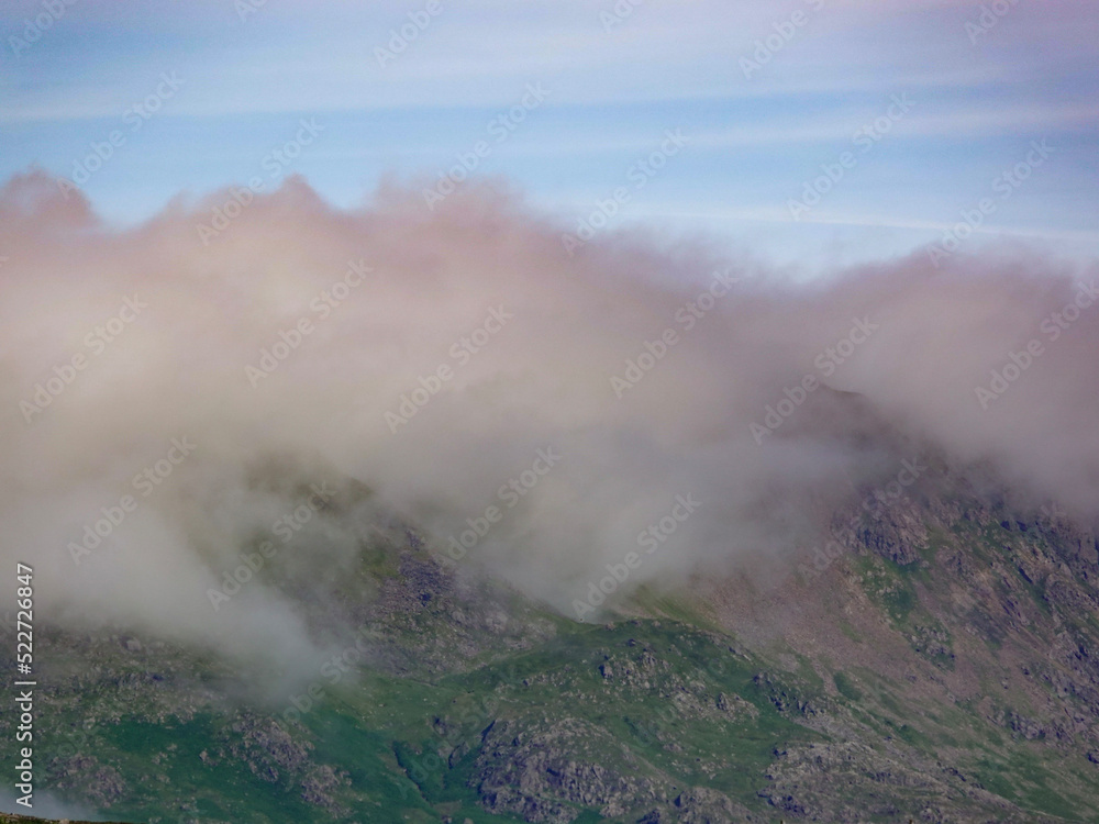 mountain top in the clouds