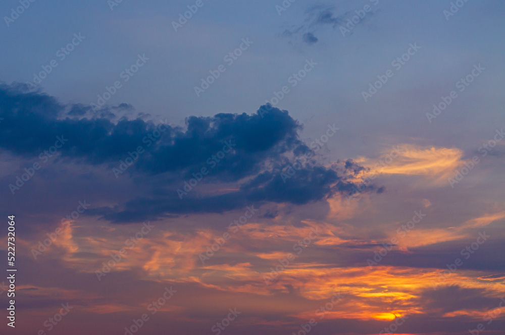 Obraz premium Clouds on the sunset sky