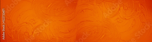 Orange acrylic or oil paint texture. Closeup of the brush stroke paint. Colorful abstract painting background banner wide panorama