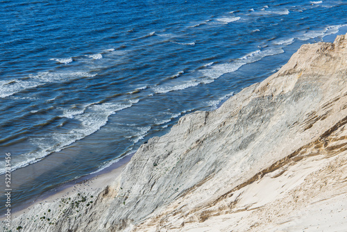 The iconic coast line in Denmark with rocks, sand dunes and the ocean © Photofex