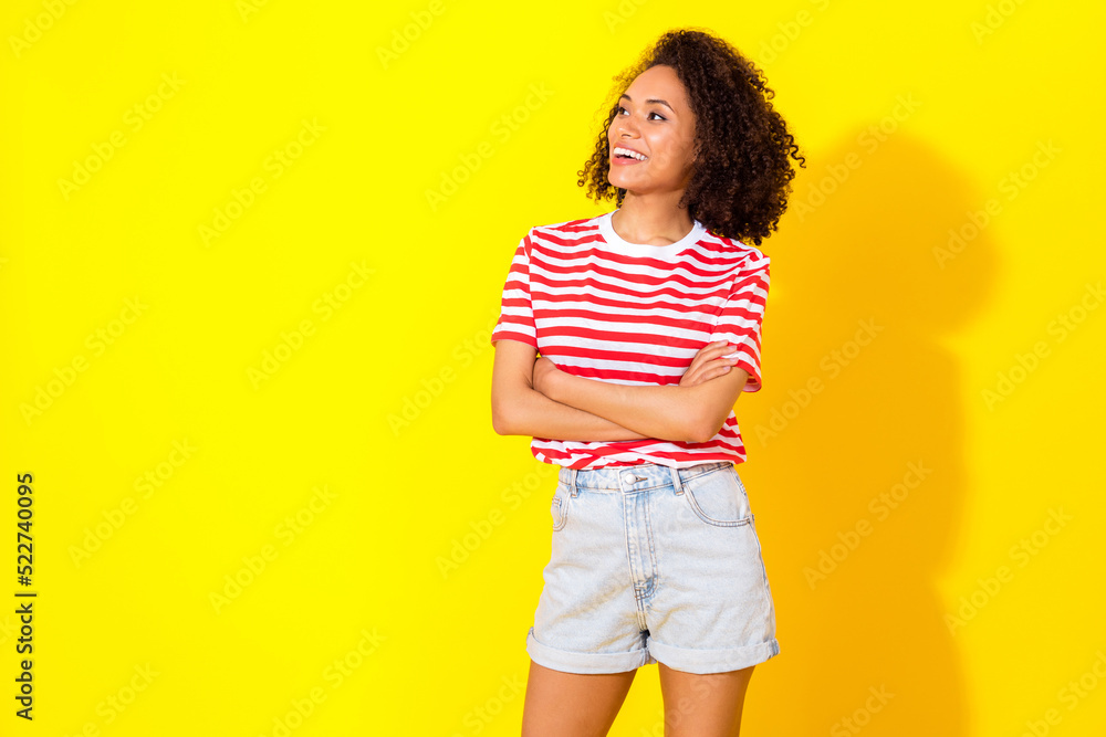 Closeup photo of young interested cute girl looking empty space new coffee shop isolated on yellow color background Closeup photo of young interested cute girl looking empty space new coffee shop isolated on yellow color background