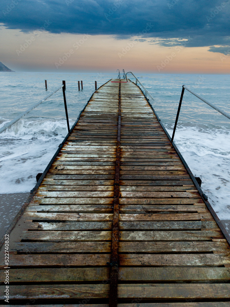 Fototapeta premium wooden pier on the beach