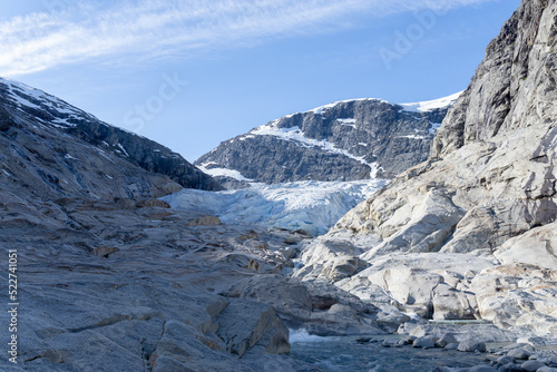 Impressive part of the Nigardsbreen glacier in Norway, with the snow-capped mountains.