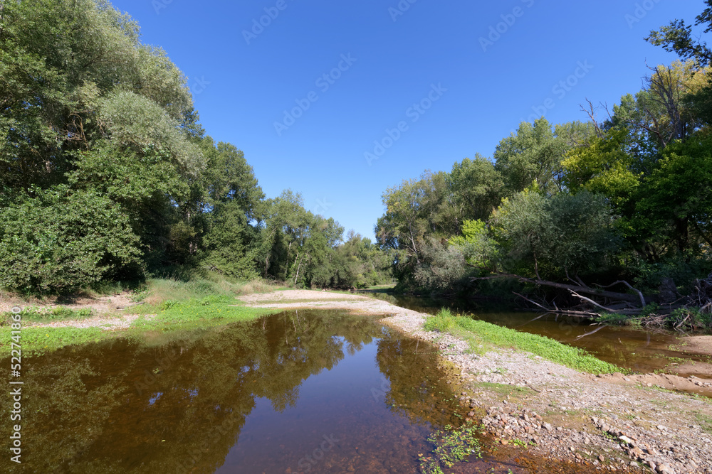 The dry bed of the Loire River near Mahyses island protected natural area The dry bed of the Loire River near Mahyses island protected natural area