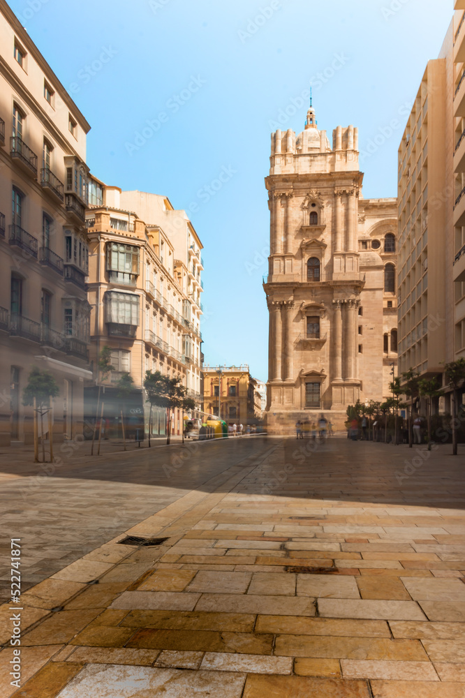 street with copy space, no people, Malaga cathedral tower in sunny day