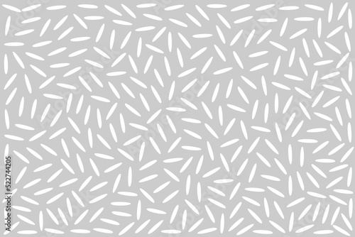 Rice grains. White rice on the grey background.