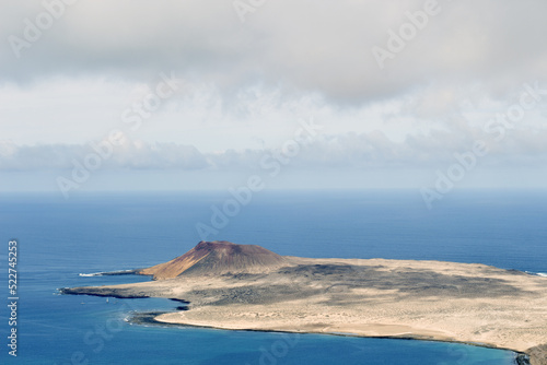  Panoramic view of the volcanic island of La Graciosa in the Atlantic Ocean, Canary Islands, Spain