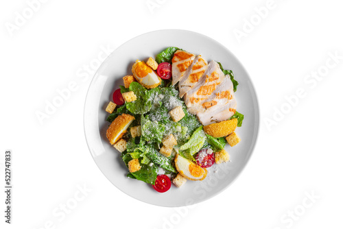 Salad with fried chicken breast, breaded boiled egg, tomatoes, croutons, spinach and parmesan