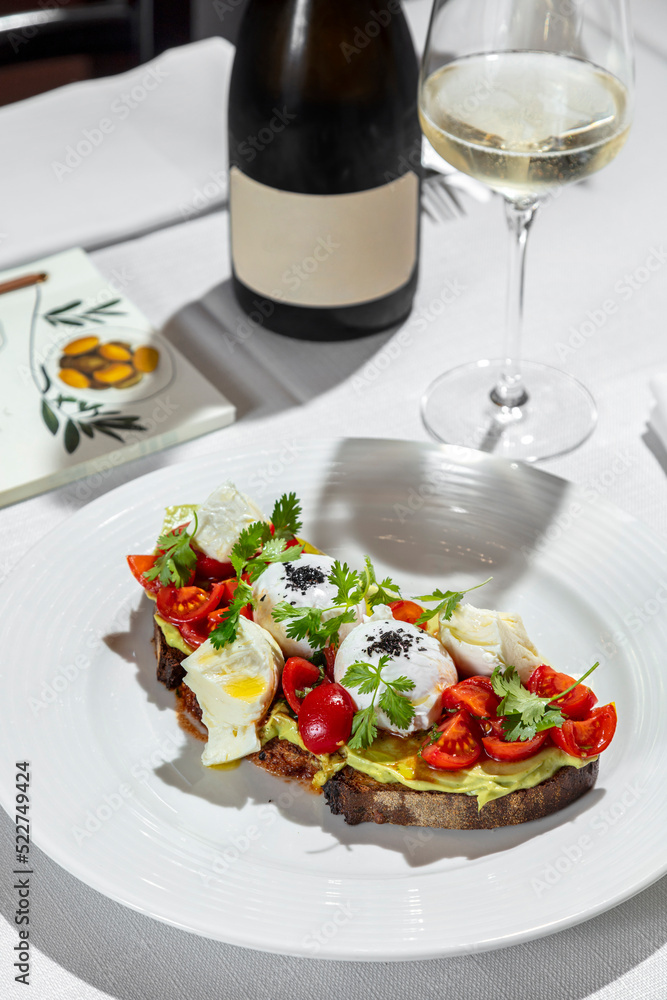 Bruschetta with tomatoes and poached egg