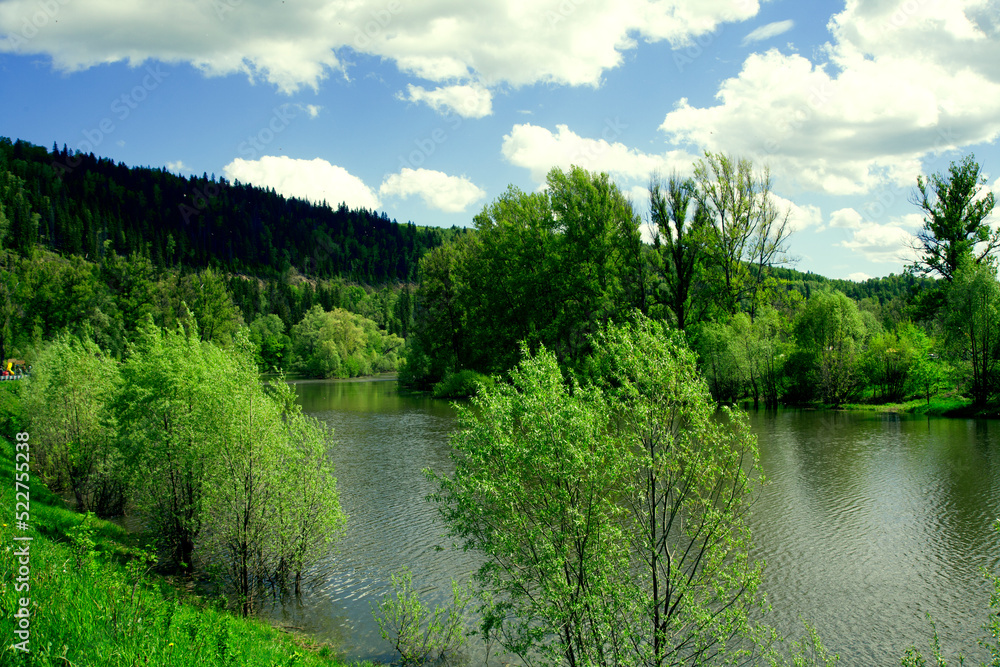 A beautiful blue big lake. Milky-blue water. Blue sky with beautiful clouds. park. a river in the forest. landscape
A beautiful blue big lake. Milky-blue water. Blue sky with beautiful clouds. park. a river in the forest. landscape