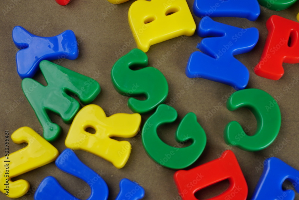 Alphabet on color background. School and education concept. Empty space for text and design Alphabet on color background. School and education concept. Empty space for text and design