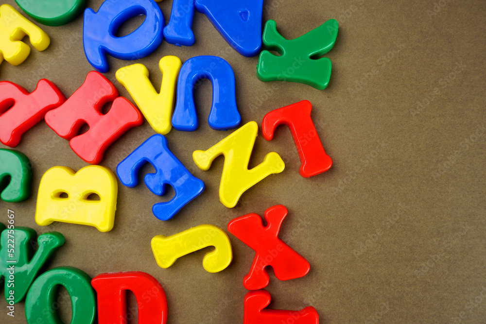 Alphabet on color background. School and education concept. Empty space for text and design Alphabet on color background. School and education concept. Empty space for text and design