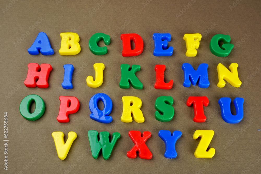 Alphabet on color background. School and education concept. Empty space for text and design Alphabet on color background. School and education concept. Empty space for text and design