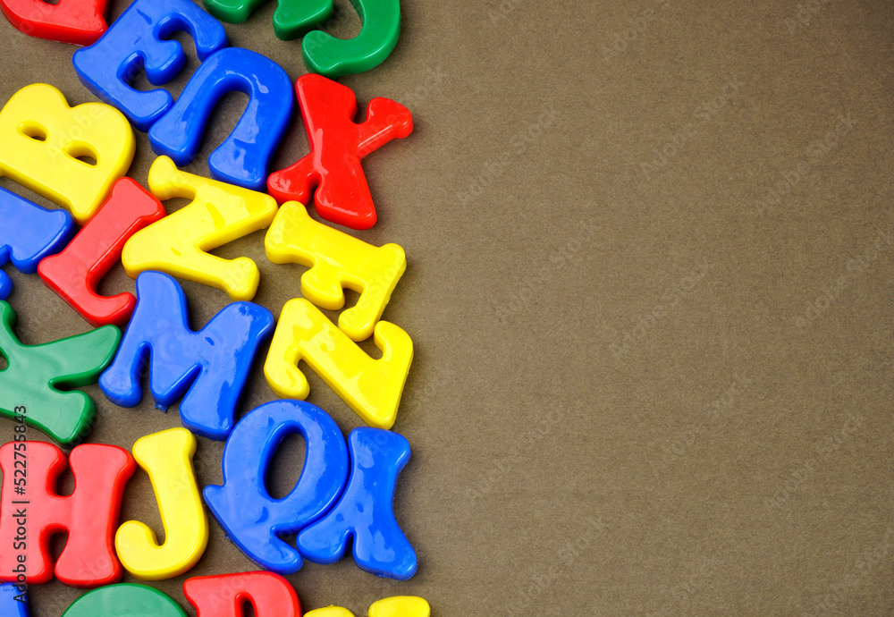 Alphabet on color background. School and education concept. Empty space for text and design Alphabet on color background. School and education concept. Empty space for text and design