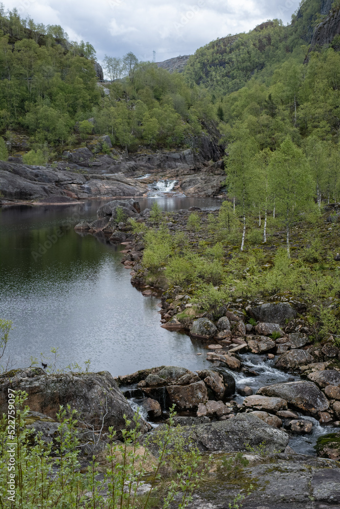 Wonderful landscapes in Norway. Agder. Beautiful scenery of Dorgefossen waterfalls located in the Sira watercourse between Omlid and Tjorhom. Sirdal municipality. Selective focus Wonderful landscapes in Norway. Agder. Beautiful scenery of Dorgefossen waterfalls located in the Sira watercourse between Omlid and Tjorhom. Sirdal municipality. Selective focus