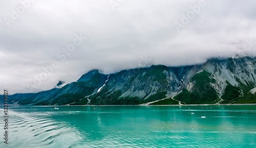 A view of the mist covered sides of Glacier Bay, Alaska in summertime