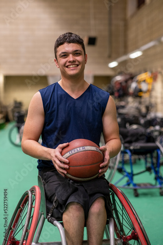 Portrait of smiling male basketball player in wheelchair © Cultura Creative