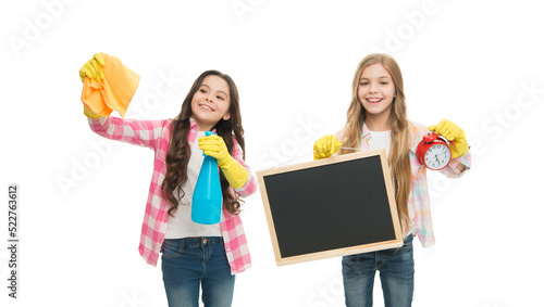 Girls with rubber protective gloves ready for cleaning. Informal education. Girls kids cleaning according to duty, blackboard copy space. Cleaning check list. Kids cleaning together. Household duties