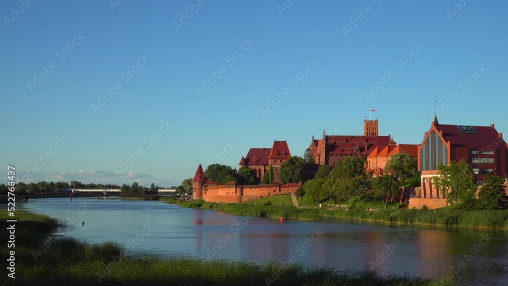 Marienburg castle in Malbork city at sunset panorama