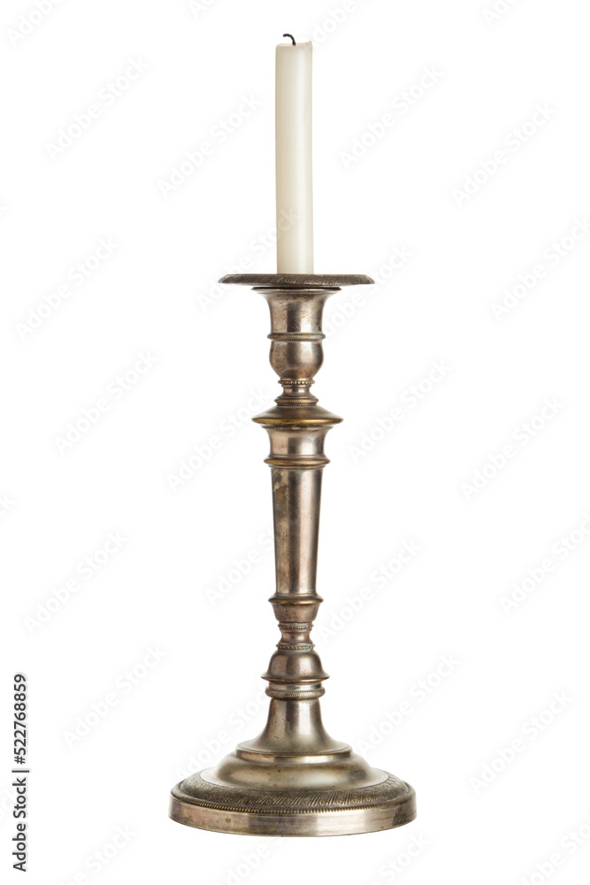 Antique silver candlestick with white candle isolated with transparent background