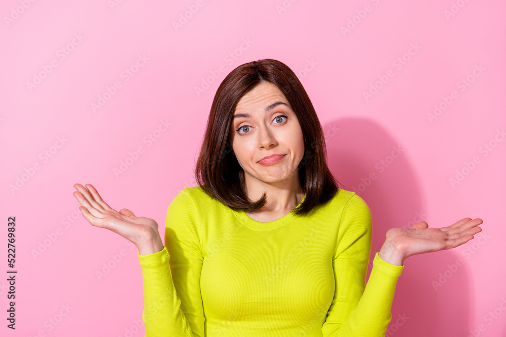 Portrait of clueless indifferent young girl raise arms palms shrug shoulders isolated on pink color background Portrait of clueless indifferent young girl raise arms palms shrug shoulders isolated on pink color background