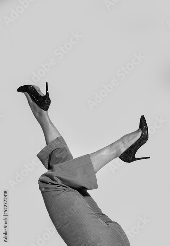 woman legs shoes stiletto heels white background