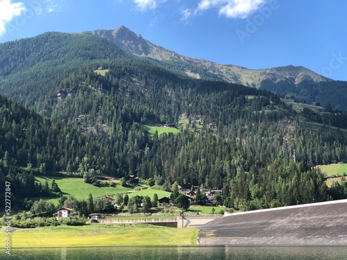 Beautiful landscape at Ulten Valley in Southtyrol with mountains and the Zoggler barrier lake  photo