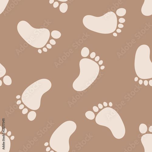 Seamless pattern with baby footprints and brown background