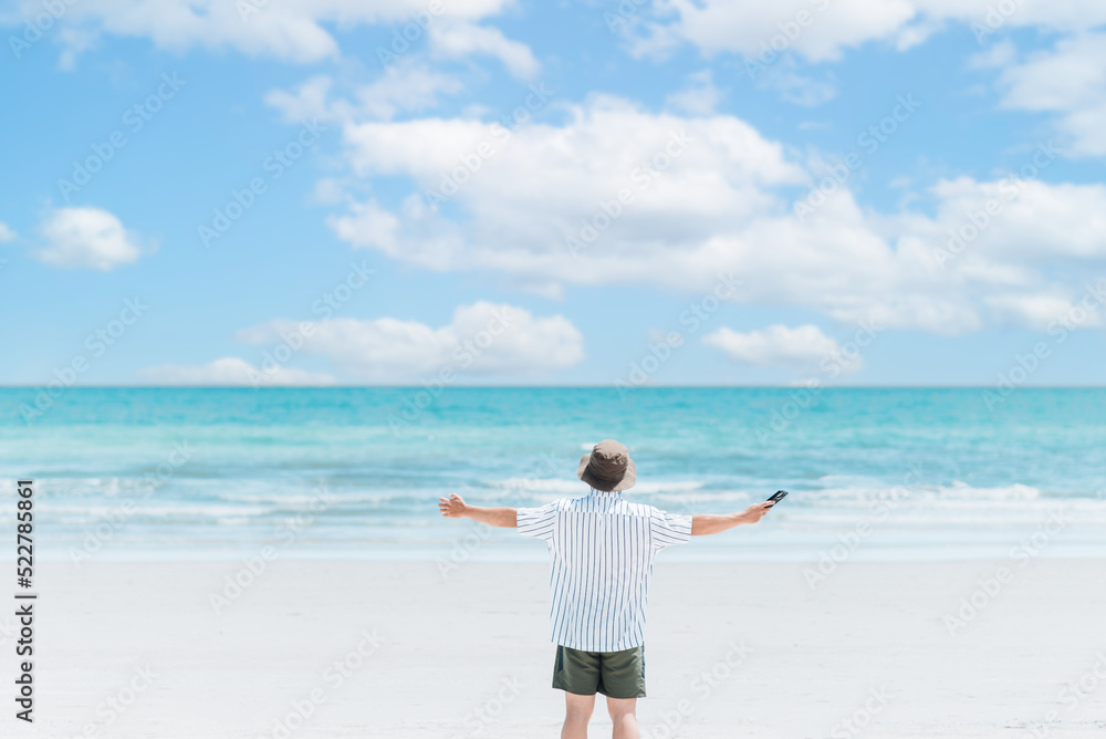 freedom life, happy on holiday, alone traveler, work life balance, a man standing on the beach, freelance lifestyle, relaxing on vacation freedom life, happy on holiday, alone traveler, work life balance, a man standing on the beach, freelance lifestyle, relaxing on vacation