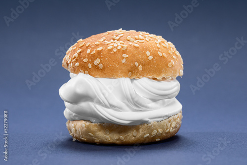 Fresh burger bun with whipped cream photo