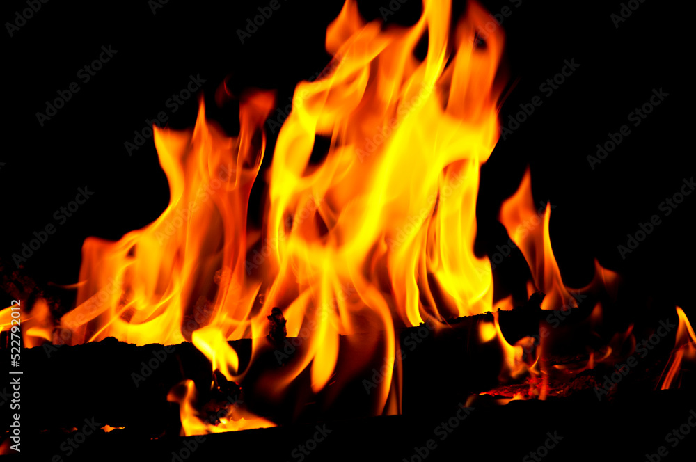 Heat energy heap closely, red and yellow, thermal energy at the fuel point during the night / lights on a black background Heat energy heap closely, red and yellow, thermal energy at the fuel point during the night / lights on a black background