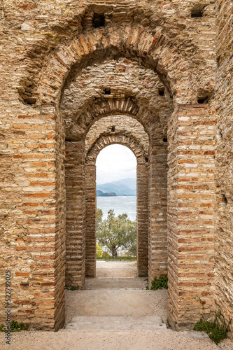 Fototapeta Naklejka Na Ścianę i Meble -  The Grottoes of Catullus, an archeological excavation site of an old roman villa at the tip of Sirmione at Lake Garda, Italy.