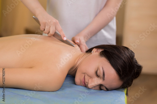Concept of beauty care and healthy body at spa salon happy woman have a spa day she doing a relaxation back massage masseur woman massage well the back muscles