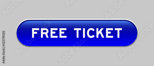 Blue color capsule shape button with word free ticket on gray background