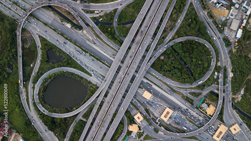 Aerial drone photo of ring road multilevel circular junction road, road junction. Aerial view of the transportation, traffic, route road and expressway in the city in Thailand.