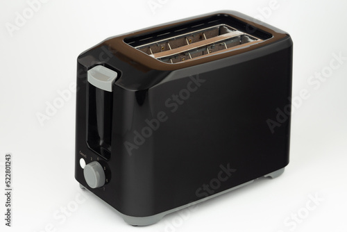 Empty black toaster isolated on white background