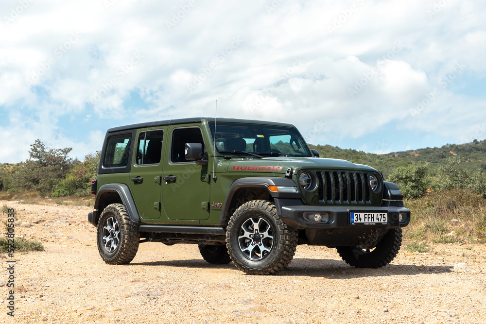 Jeep Wrangler Rubicon is the 4-door off-road vehicle manufactured by Jeep.  Stock Photo | Adobe Stock