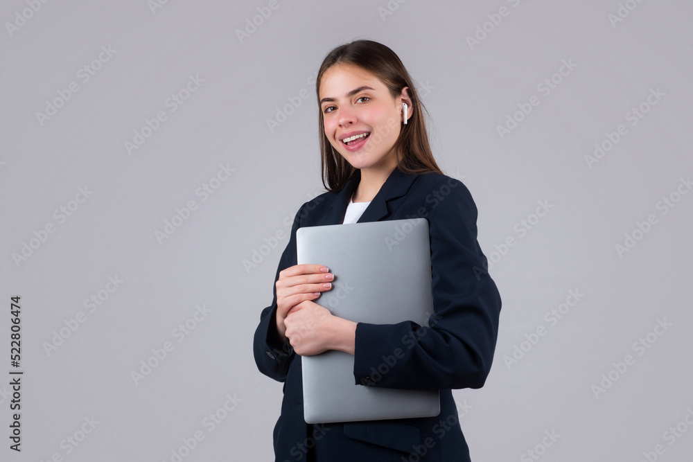 Charming positive lady hold laptop, isolated background. Young secretary. Charming positive lady hold laptop, isolated background. Young secretary.