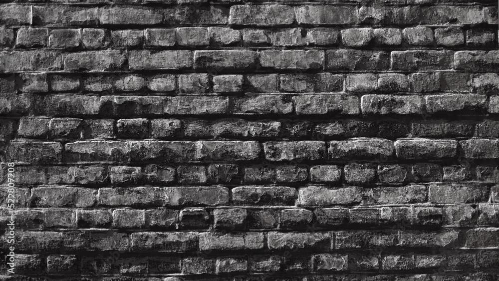 Fototapeta premium gray background, in the photo is a brick wall close-up, bottom view