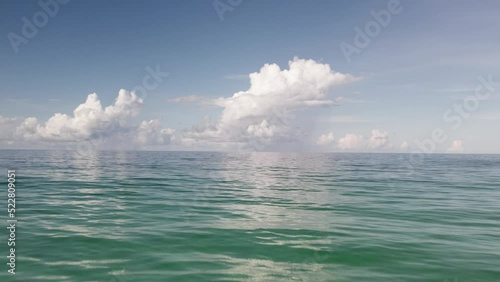 Low level aerial over Florida's gulf coast with beautiful clouds photo