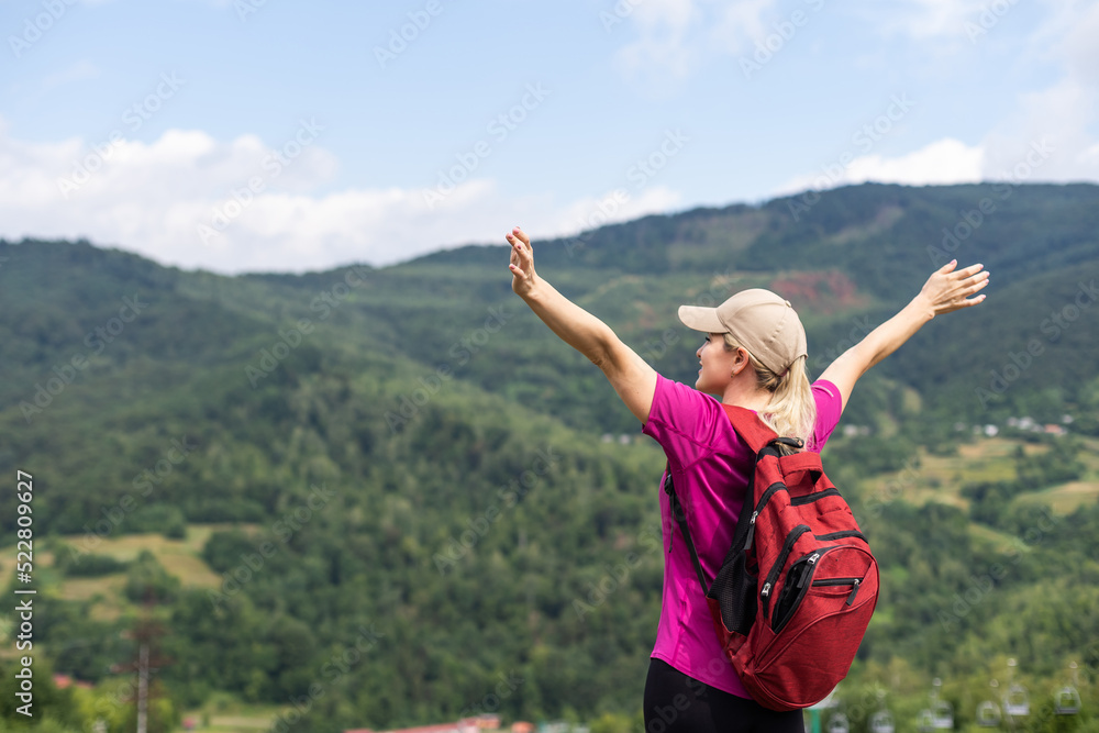 Girl Traveler hiking with backpack at rocky mountains landscape Travel Lifestyle concept adventure summer vacations outdoor. Girl Traveler hiking with backpack at rocky mountains landscape Travel Lifestyle concept adventure summer vacations outdoor.