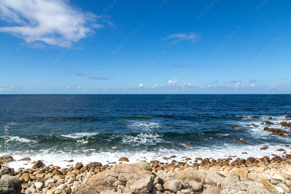 Looking out to sea over a rocky beach on the west of Cornwall Looking out to sea over a rocky beach on the west of Cornwall