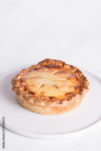 Cooked pie on plate