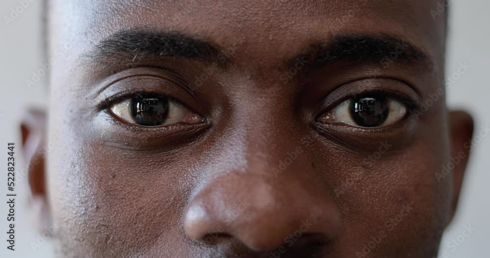 Close-up of the guy's eyes. Portrait of a young African American model looking at the camera. Close-up of the guy's eyes. Portrait of a young African American model looking at the camera.